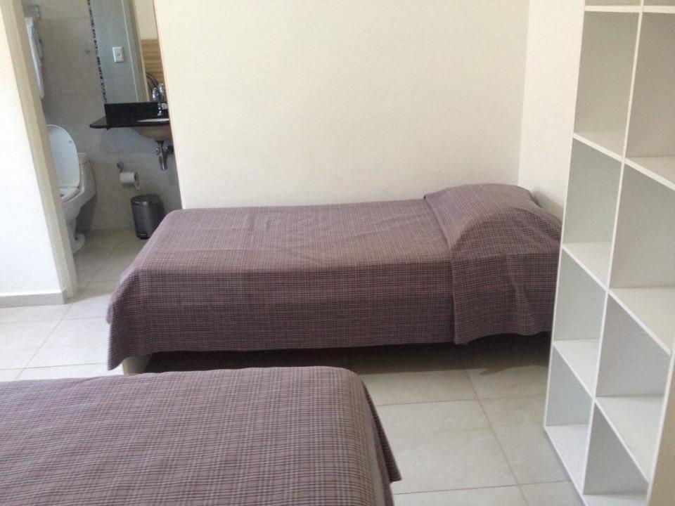 Pousada Parque Suites Estacionamento E Piscina Guarujá Zimmer foto